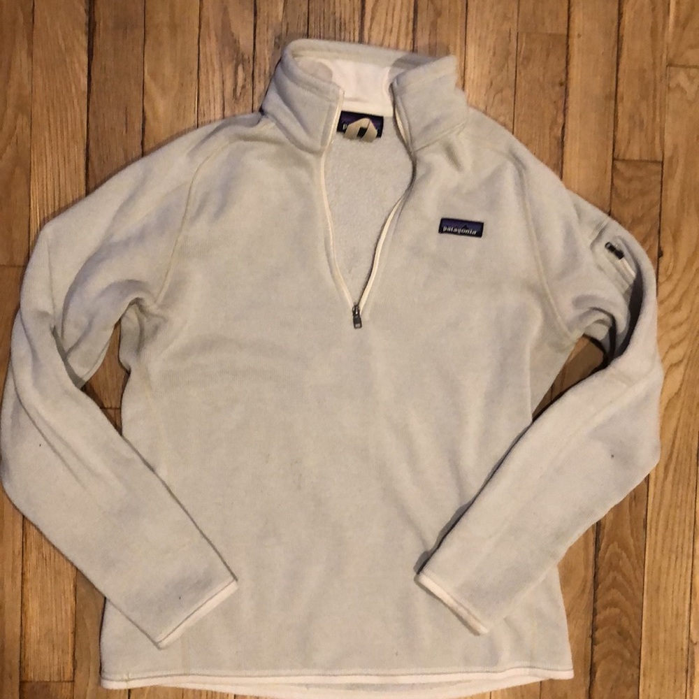 Patagonia cream colored 3/4 zip fleece.